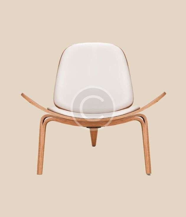 White molded accent chair with wood frame